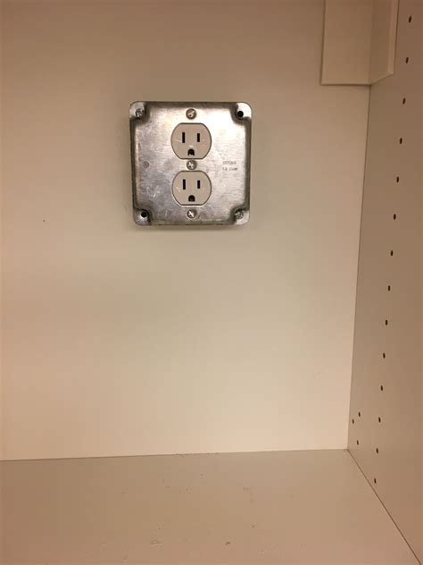 cabinet to cover electrical box|inside cabinet outlet box.